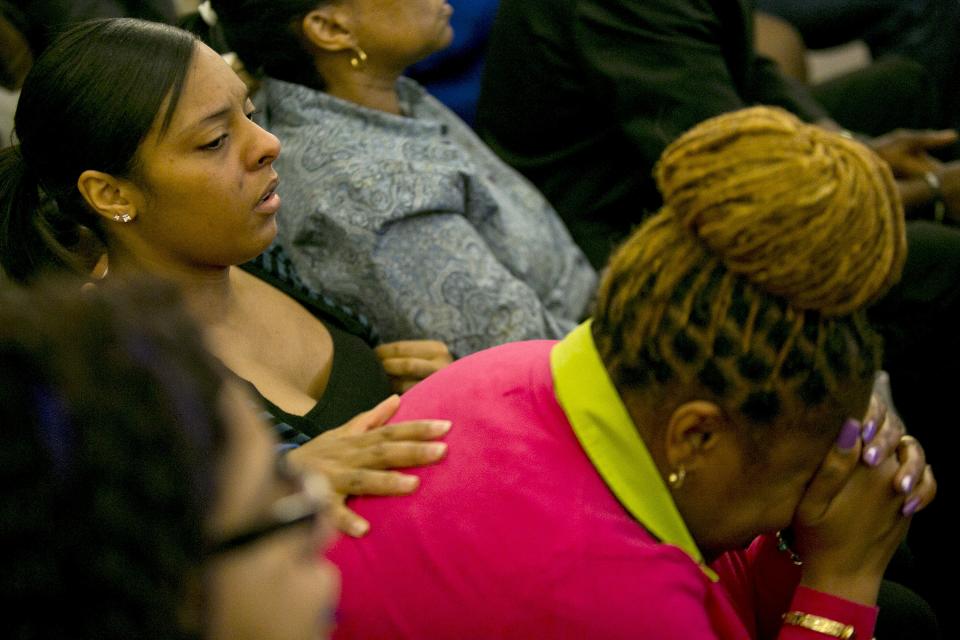 Shaneah Jenkins (L), girlfriend of the victim, reacts as former NFL player Aaron Hernandez is found guilty during his murder trial at the Bristol County Superior Court in Fall River, Massachusetts, April 15, 2015. Hernandez, 25, a former tight end for the New England Patriots, is convicted of fatally shooting semiprofessional football player Odin Lloyd in an industrial park near Hernandez's Massachusetts home in June 2013. REUTERS/Dominick Reuter