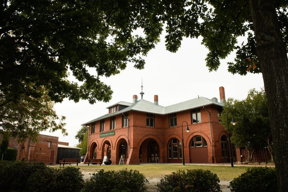 The Cape Fear and Yadkin Valley Railway Passenger Depot is a historic train station located at 148 Maxwell St., which was built in 1890. The depot is now home to the Fayetteville History Museum. Under the 1996 Vision Plan for downtown Fayetteville, this would have been the site of a fitness center and gymnasium.