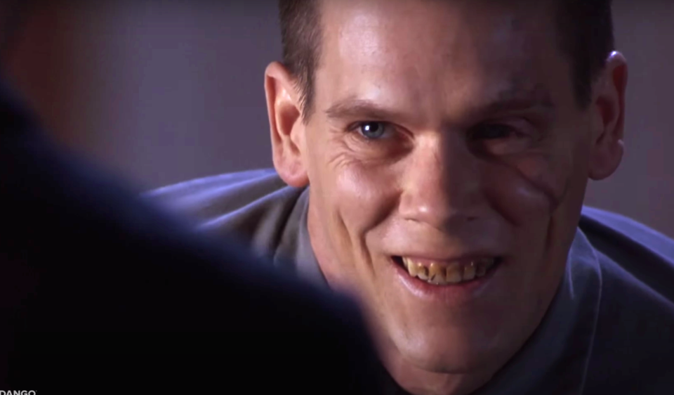 Bacon smiles as the prisoner in murder in the first with stained teeth