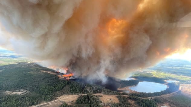 A smoke column rises from a wildfire near Lodgepole, Alberta, Canada on May 4. More than 13,000 people who live in the Canadian province of Alberta have been evacuated as wildfires rage across the region. (Alberta Wildfire/Handout/Reuters)