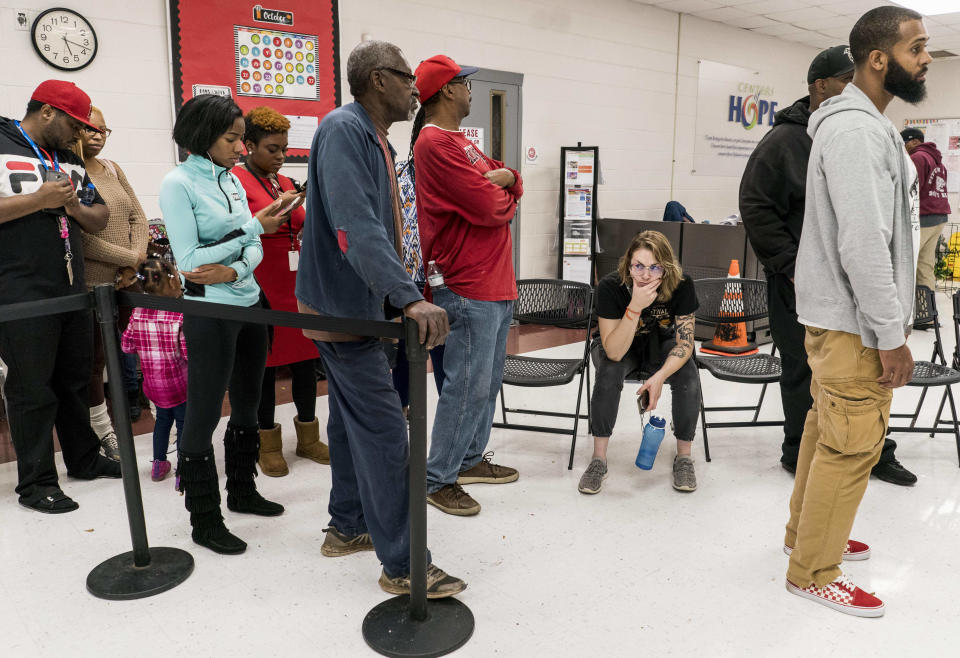 Long lines at the polls in Georgia on Tuesday were a reminder that voting in many minority communities is difficult, which may have something to do with the Republican state officials in charge. (Photo: The Washington Post via Getty Images)