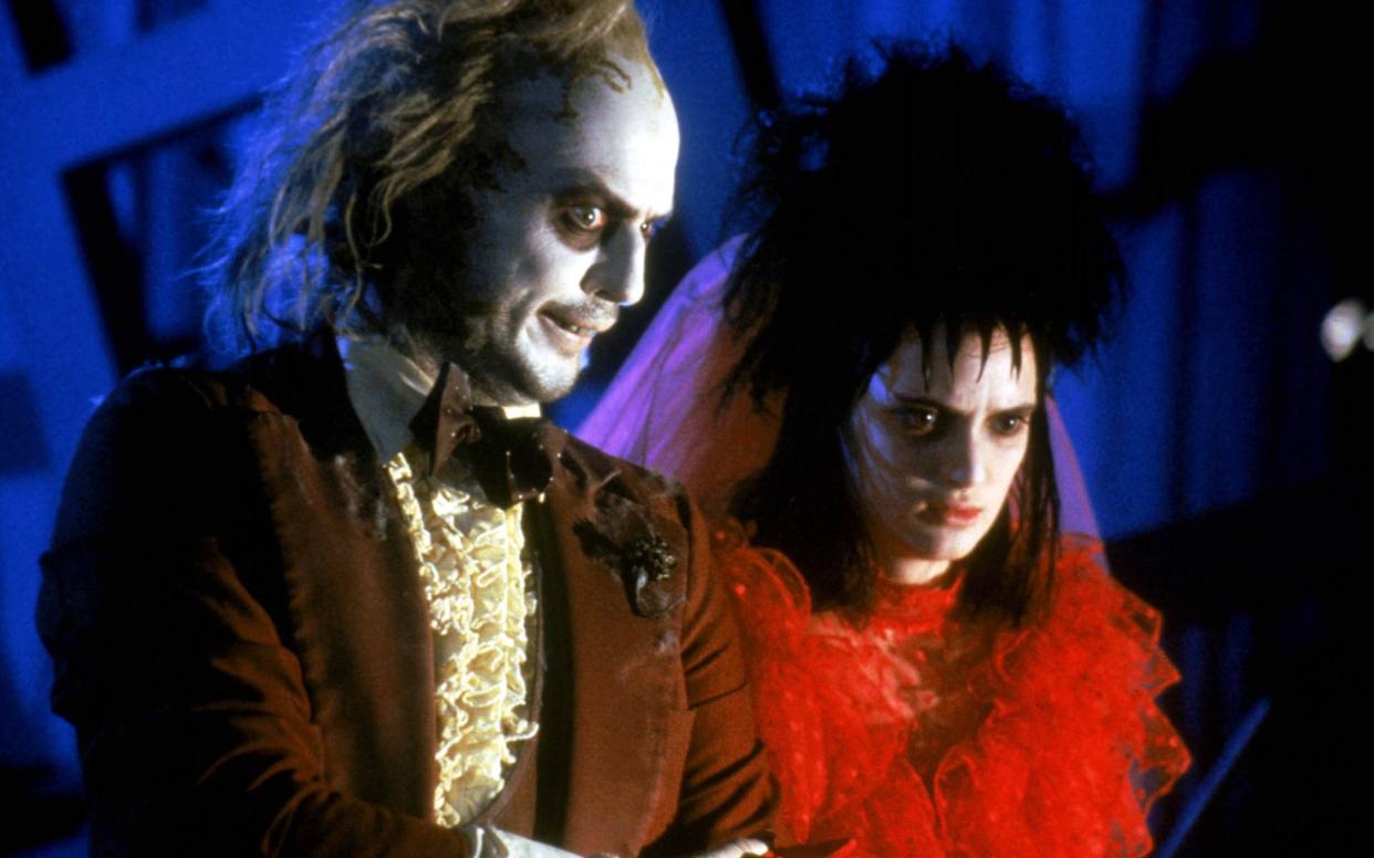 Michael Keaton and Winona Ryder in Beetlejuice (1988)