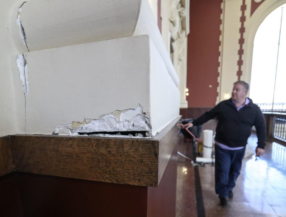 Jim Russell, director of the state's Division of Facilities Construction and Management, looks at damage to the Rio Grande Depot in Salt Lake City on April 9, 2020. The damage was caused by a 5.7 magnitude earthquake centered in Magna on March 18, 2020.
