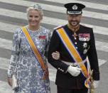 FILE PHOTO - Crown Prince Haakon (R) and Crown Princess Mette-Marit of Norway arrive for a religious ceremony at Nieuwe Kerk church in Amsterdam April 30, 2013. REUTERS/Paul Vreeker