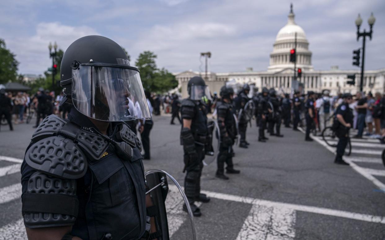 Officers in full riot gear have sealed the perimeter of the Supreme Court - GETTY IMAGES
