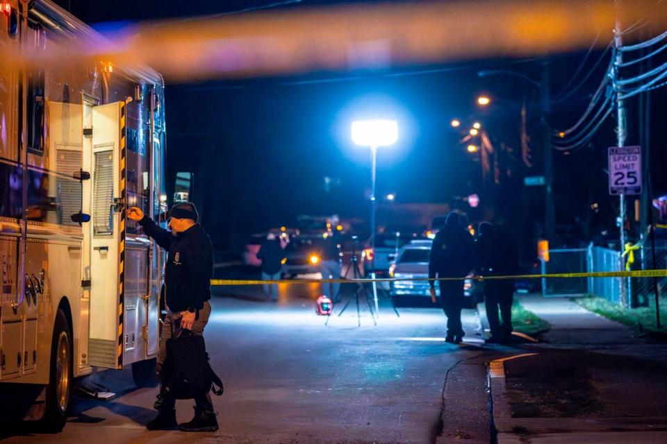 Members of the Lexington Police Department work the scene where a detective was shot overnight near Royal Avenue in Lexington, Ky., on Thursday, Feb. 29, 2024. The detective suffered minor injuries but did not require hospitalization, according to police.