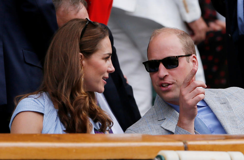 Tennis - Wimbledon - All England Lawn Tennis and Croquet Club, London, Britain - July 14, 2019  Britain's Catherine, Duchess of Cambridge, and Britain's Prince William, the Duke of Cambridge, in the Royal Box during the final between Switzerland's Roger Federer and Serbia's Novak Djokovic  REUTERS/Andrew Couldridge