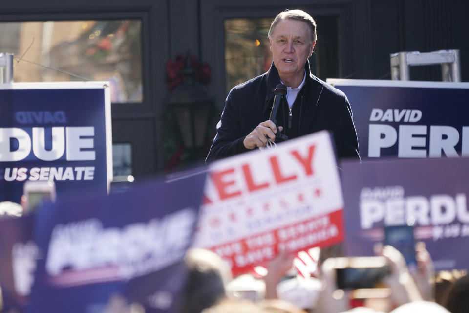 Sen. David Perdue, R-Ga., speaks during a campaign rally, Monday, Dec. 21, 2020, in Milton, Ga. (AP Photo/John Bazemore)