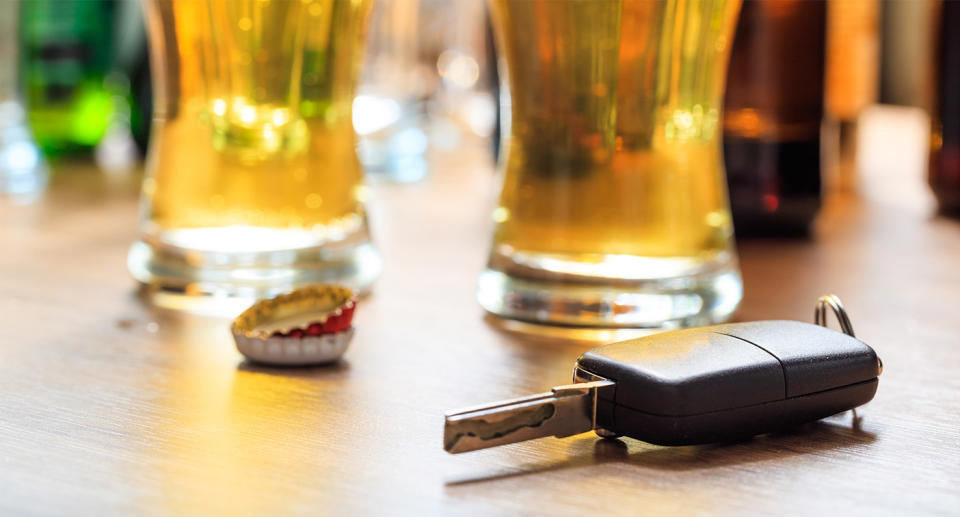Car keys next to beer to represent going over the legal drink-drive limit. (Getty Images)