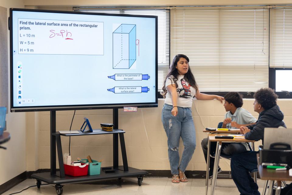 Bianca Rocha teaches an eighth grade math class Friday during a summer semester at Mendez Middle School. The percentage of eighth graders at the school who passed math on the STAAR exam dipped slightly this year to 68% from last year's 70%.