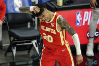 Atlanta Hawks forward John Collins (20) reacts after making a three pointer to put the Hawks ahead of Washington Wizards during the second half of an NBA basketball game Wednesday, May 12, 2021, in Atlanta. Atlanta Hawks defeated the Washington Wizards 120-116. (AP Photo/Butch Dill)