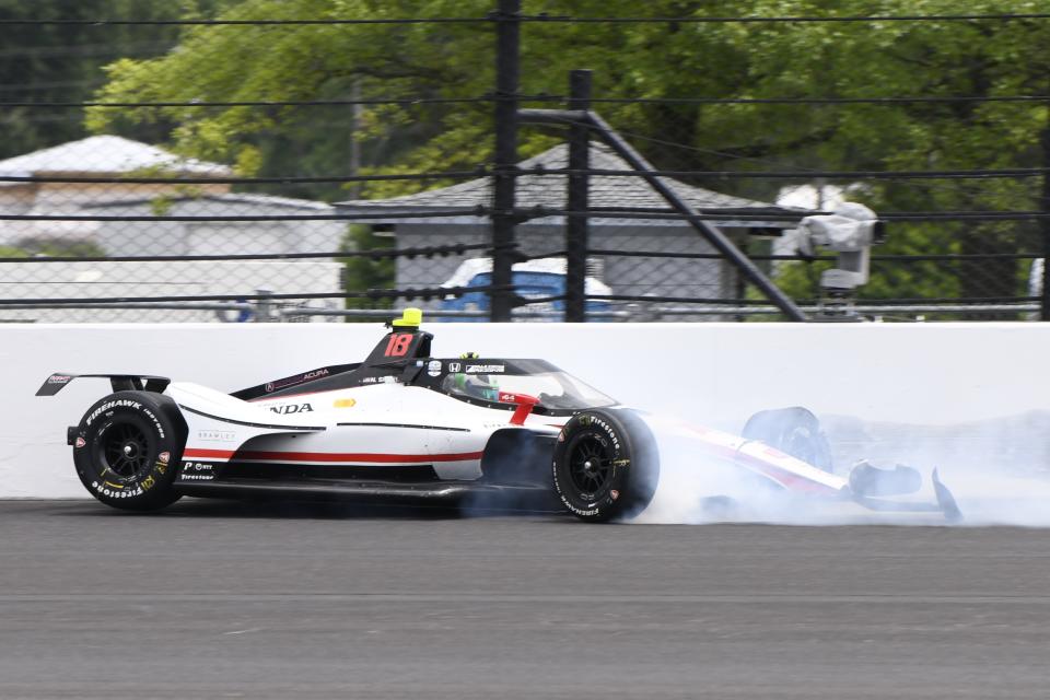 Nolan Siegel wrecks during a practice session for the Indianapolis 500 auto race at Indianapolis Motor Speedway, Friday, May 17, 2024, in Indianapolis. (AP Photo/Jamie Gallagher)
