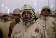 Members of police stand guard at a site where farmers have gathered to protest against farm laws at Ghaziabad