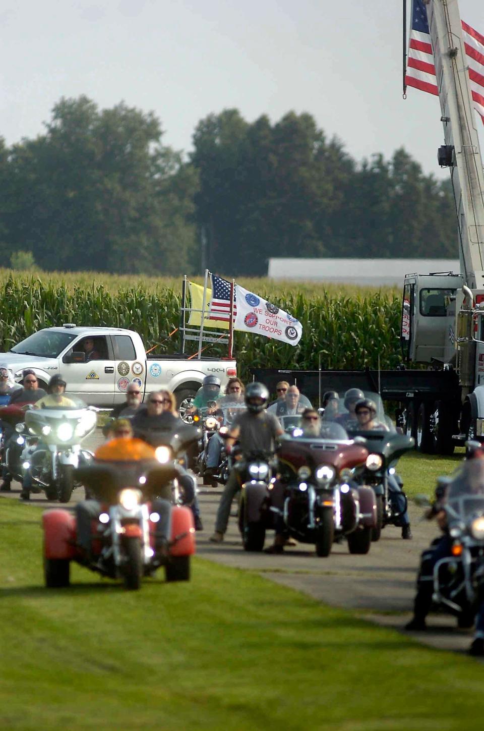 The American Veterans Travelling Tribute Vietnam Wall arrived at the Ashland County Airport Wednesday escorted by a caravan of 116 vehicles. Cyclists were part of the motorcade including law enforcement vehicles greeting well-wishers along the route.
