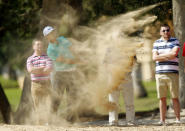 Thorbjorn Olesen of Denmark plays a shot at the second hole during the fourth and final round of the Dubai Desert Classic at the Emirates Golf Club February 3, 2013. REUTERS/Jumana El Heloueh (UNITED ARAB EMIRATES - Tags: SPORT GOLF TPX IMAGES OF THE DAY) - RTR3DAP0