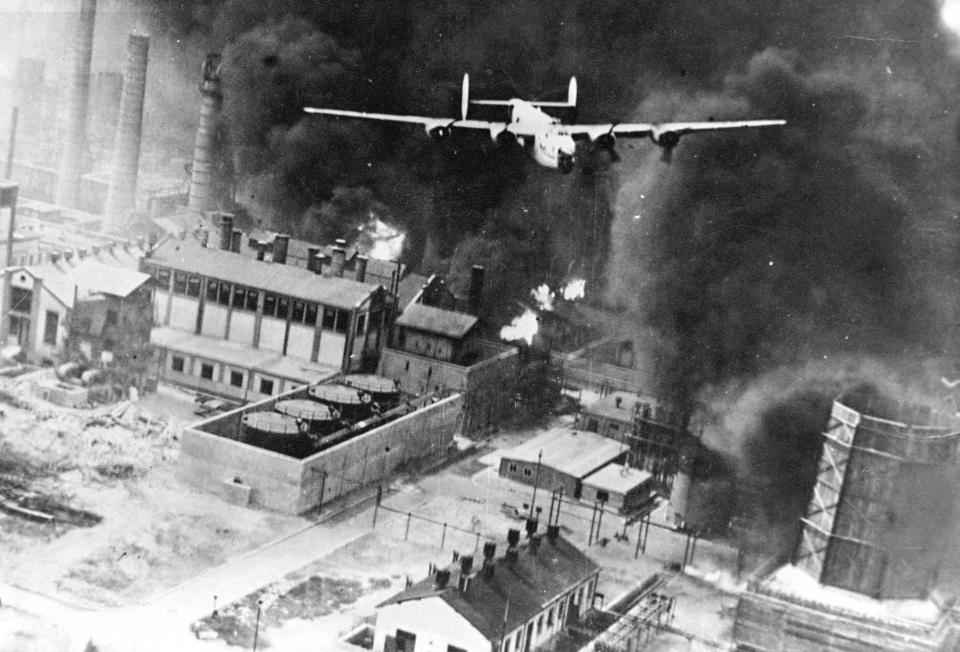 B-24 bomber over burning oil refinery in Ploesti Romania