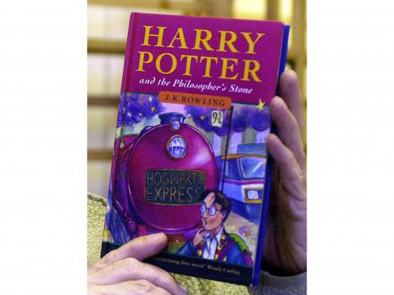 A hardback first edition of Harry Potter and the Philosopher's Stone by JK Rowling (Barry Batchelor/PA)