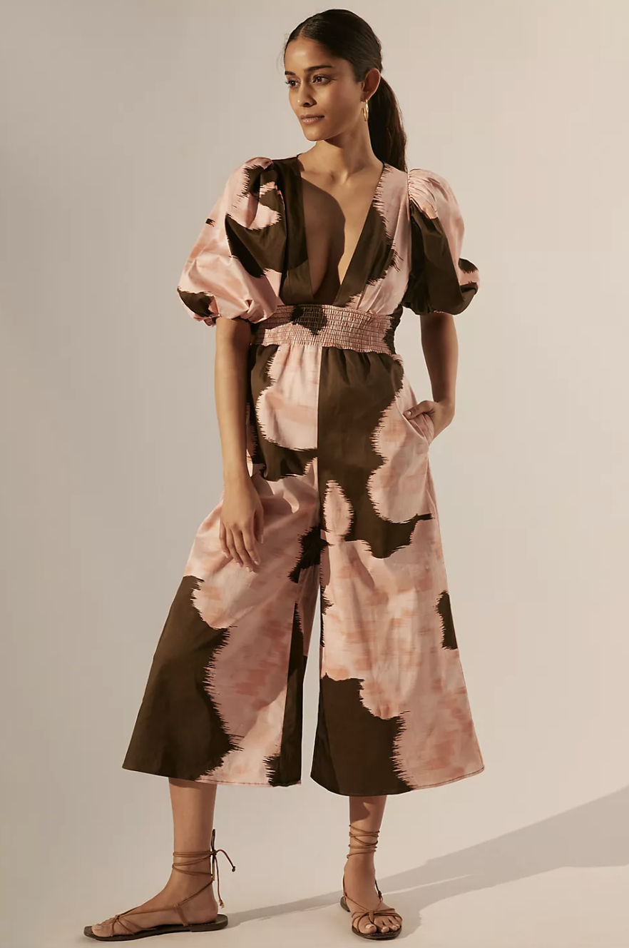 model in pink and brown floral Hutch V-Neck Jumpsuit (Photo via Anthropologie)