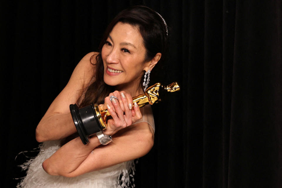 Best Actress Michelle Yeoh poses with her Oscar in the photo room at the 95th Academy Awards in Hollywood, Los Angeles, California, U.S., March 12, 2023. REUTERS/Mike Blake     TPX IMAGES OF THE DAY