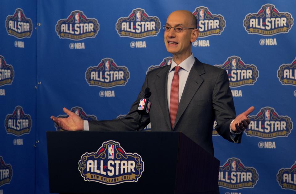 NBA Commissioner Adam Silver indicates the ample curvature of the Earth. (AP)