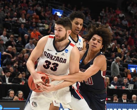 Mar 21, 2019; Salt Lake City, UT, USA; Gonzaga Bulldogs forward Killian Tillie (33) gets a rebound against the Fairleigh Dickinson Knights in the first half in the first round of the 2019 NCAA Tournament at Vivint Smart Home Arena. Mandatory Credit: Kirby Lee-USA TODAY Sports