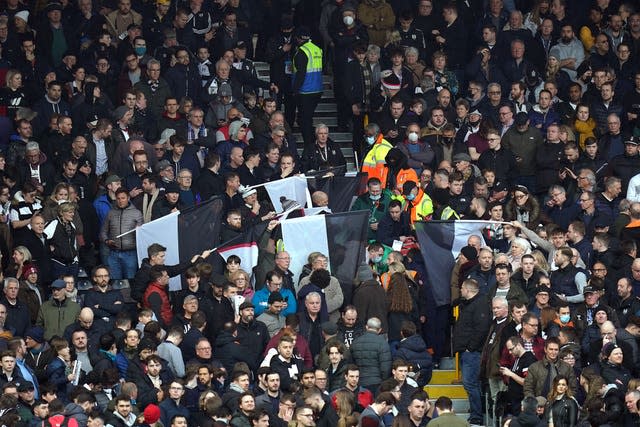 Play is stopped for a medical emergency in the stands at Fulham