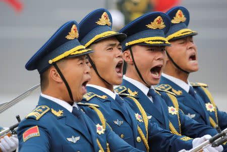 Members of honour guards attend a welcoming ceremony for Tajikistan's President Emomali Rahmon outside the Great Hall of the People in Beijing, China August 31, 2017. REUTERS/Jason Lee