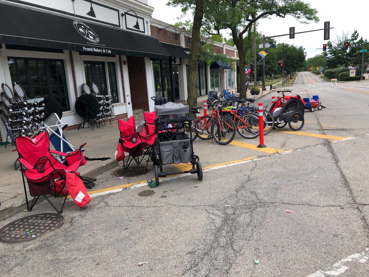 Terrified parade-goers fled Highland Park's Fourth of July parade after shots were fired, leaving behind their belongings as they sought safety, Monday, July 4, 2022, in Highland Park, Ill.