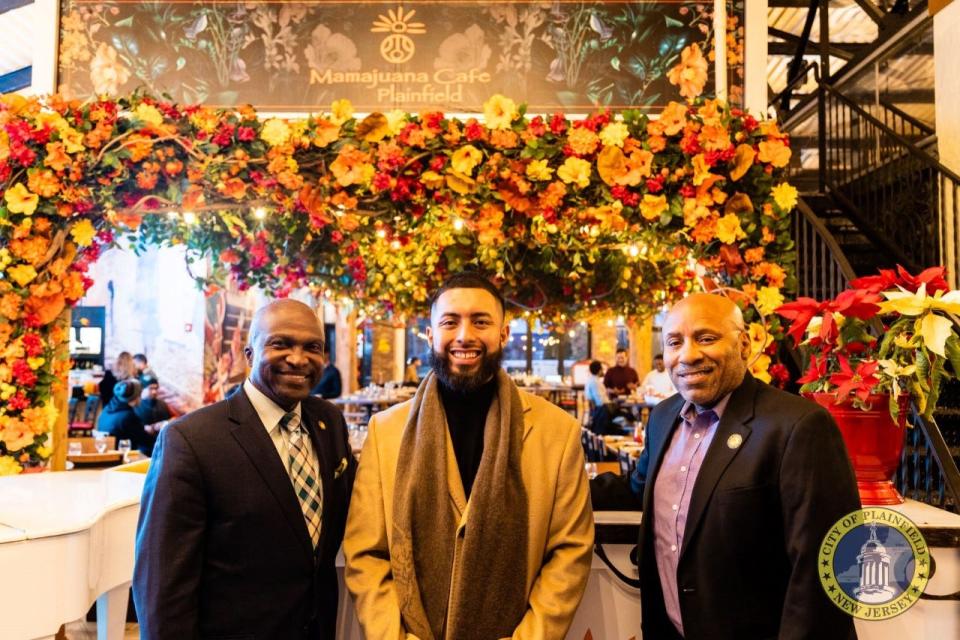 Planifield Mayor Adrian Mapp, Mamajuana Cafe owner Erick Garcia and Plainfield Council President Barry Goode attend the grand opening of the Mamajuana Cafe on Watchung Avenue which offers Nuevo Latino Cuisine