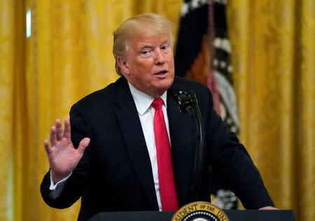 U.S. President Donald Trump hosts an event honoring those working for Immigration and Customs Enforcement and Customs Border Protection at the White House in Washington, U.S., August 20, 2018. REUTERS/Kevin Lamarque