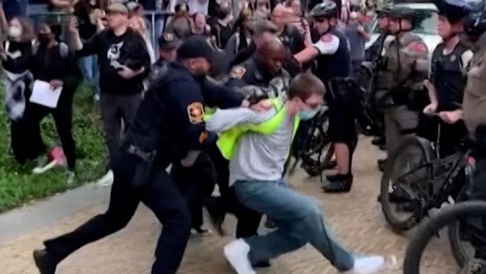 UT at Austin later said that around half of those arrested during campus protests on Wednesday were not affiliated with the university (Reuters)