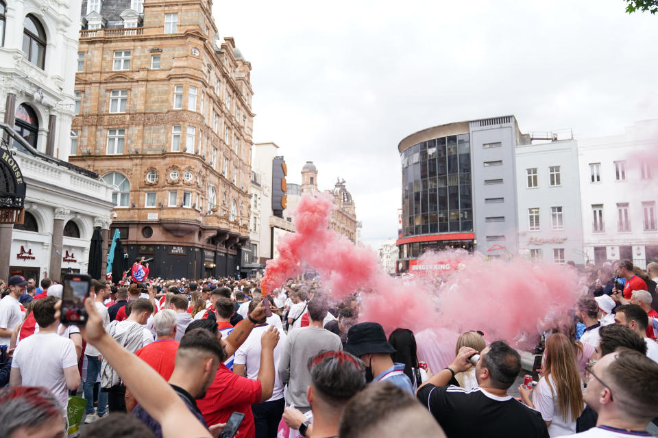 England fans partying in Leicester Square, central London, ahead of the England football team playing in the UEFA Euro 2020 Final. Picture date: Sunday July 11, 2021.