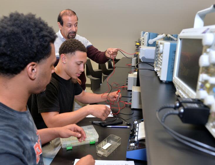 BATON ROUGE,LOUISIANA - FEBRUARY 15: Southern University and A&M College Electrical Engineering students listens to instructions from their professor while working in the circuits lab February 15, 2024 on the campus of Southern University and A&M College in Baton Rouge, Louisiana. (Photo by Naville J. Oubre III/Southern University and A&M College via Getty Images).