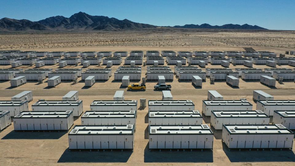 Large Crimson Energy Storage batteries, seen near Blythe in 2022, store energy when demand is low and feed it into the grid when people use more electricity.