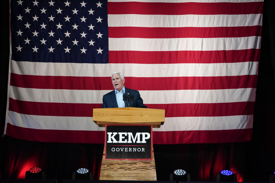 Former Vice President Mike Pence speaks on behalf of Georgia Gov. Brian Kemp during a rally, Monday, May 23, 2022, in Kennesaw, Ga. Pence is opposing former President Donald Trump and his preferred Republican candidate for Georgia governor, former U.S. Sen. David Perdue. (AP Photo/Brynn Anderson)