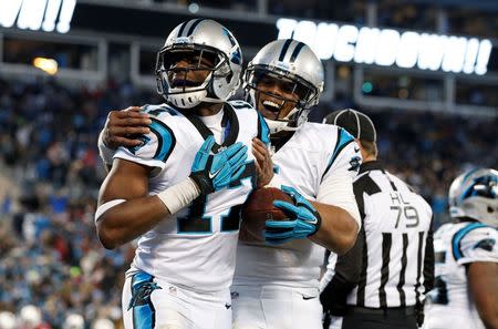 Jan 24, 2016; Charlotte, NC, USA; Carolina Panthers wide receiver Devin Funchess (17) and quarterback Cam Newton (1) celebrate a touchdown during the fourth quarter against the Arizona Cardinals in the NFC Championship football game at Bank of America Stadium. Mandatory Credit: Jason Getz-USA TODAY Sports