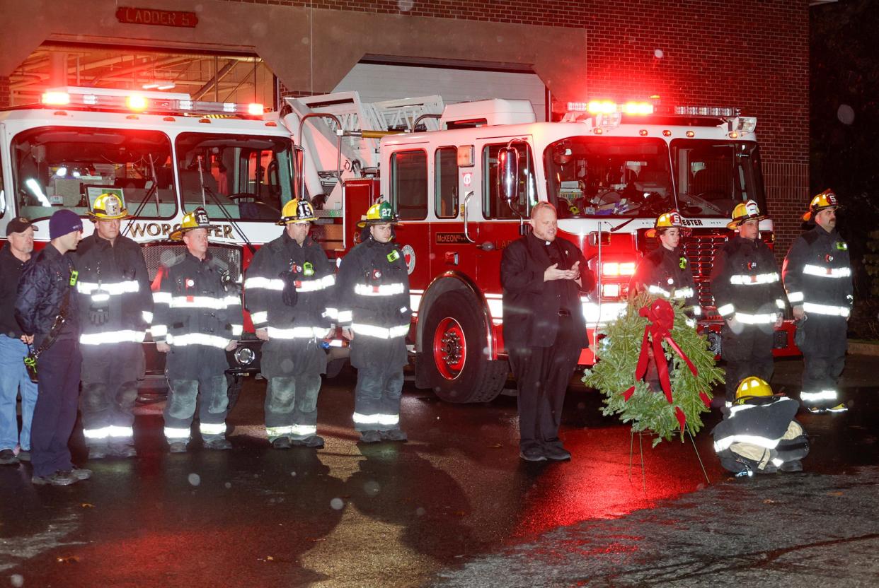Rev. Jonathan J. Slavinskas, chaplain for the Worcester Fire Department, speaks during a gathering at the McKeon Road fire station Monday to remember Lt. Jason Menard, who died in a blaze on Stockholm Street four years ago.