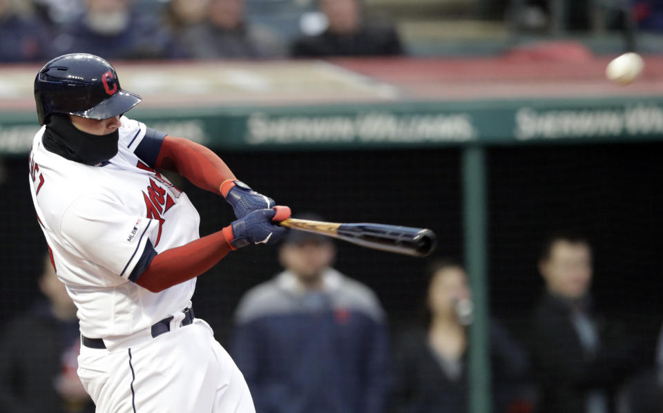 Cleveland Indians' Roberto Perez hits a sacrifice fly off Toronto Blue Jays starting pitcher Aaron Sanchez in the fourth inning of a baseball game, Thursday, April 4, 2019, in Cleveland. Carlos Santana scored on the play. (AP Photo/Tony Dejak)