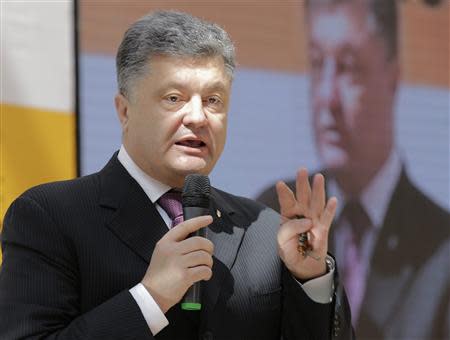 Ukrainian tycoon and presidential election candidate Petro Poroshenko delivers a speech during "Ukraine-Russia: the Dialogue" congress in Kiev April 25, 2014. REUTERS/Tatyana Makeyeva