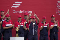 Team USA captain Steve Stricker holds up a "W" for Wisconsin at the closing ceremony after the Ryder Cup matches at the Whistling Straits Golf Course Sunday, Sept. 26, 2021, in Sheboygan, Wis. (AP Photo/Charlie Neibergall)