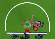 Klay Thompson (USA) of USA shoots during practice. REUTERS/Pool