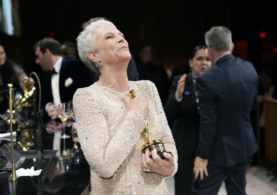 ‘Nepo baby’ Jamie Lee Curtis at an Oscars afterparty, with her Oscar. John Locher/ AP
