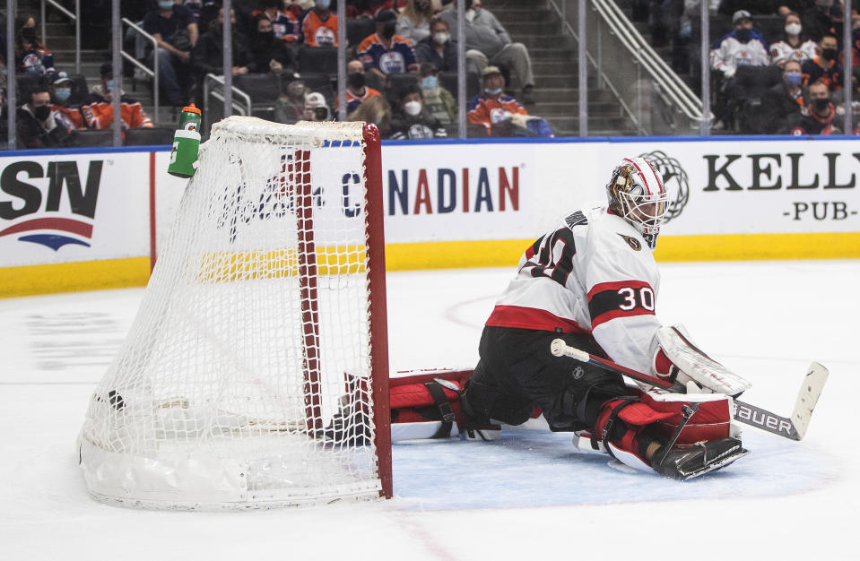 Ottawa Senators goalie Matt Murray (30) is scored on by the Edmonton Oilers during the second period of an NHL hockey game, Saturday, Jan. 15, 2022 in Edmonton, Alberta. (Jason Franson/The Canadian Press via AP)