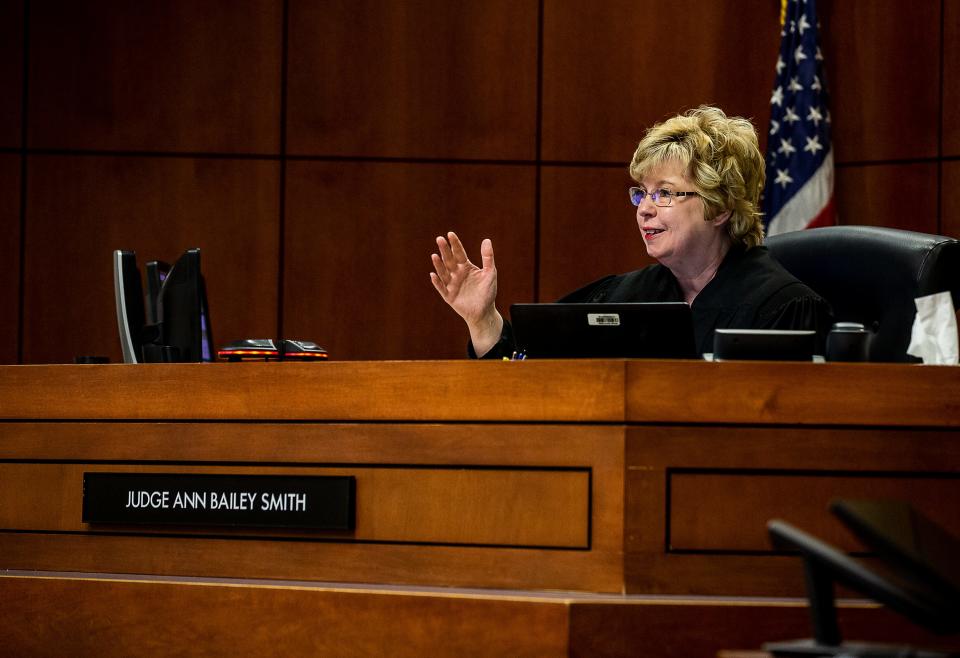 Circuit Judge Ann Bailey Smith gestures while talking to defense attorney Stew Mathews during a pre-trial conference on Friday. Judge Smith moved the trial to Feb. 1, 2022, because of a Kentucky Supreme Court directive giving priority to trials of people being held in jail. April 23, 2021