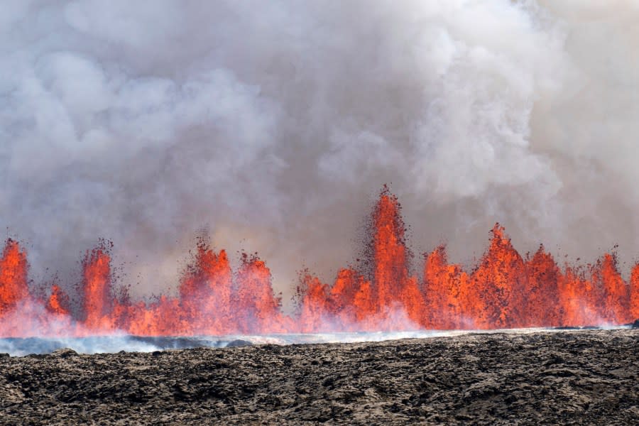 A volcano spews lava in Grindavik, Iceland, Wednesday, May 29, 2024. A volcano in southwestern Iceland is erupting, spewing red streams of lava in its latest display of nature’s power. A series of earthquakes before the eruption Wednesday triggered the evacuation of the popular Blue Lagoon geothermal spa. The eruption began in the early afternoon north of Grindavik, a coastal town of 3,800 people that was also evacuated. (AP Photo/Marco di Marco)