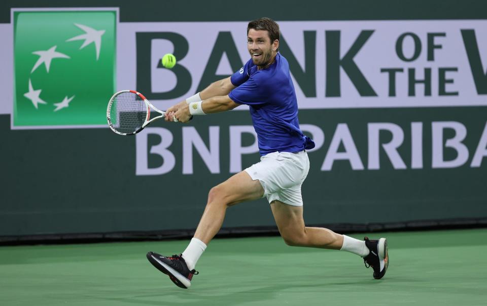  Cameron Norrie of Great Britain plays a backhand against Nikoloz Basilashvili of Georgia in the men's final match - Getty Images