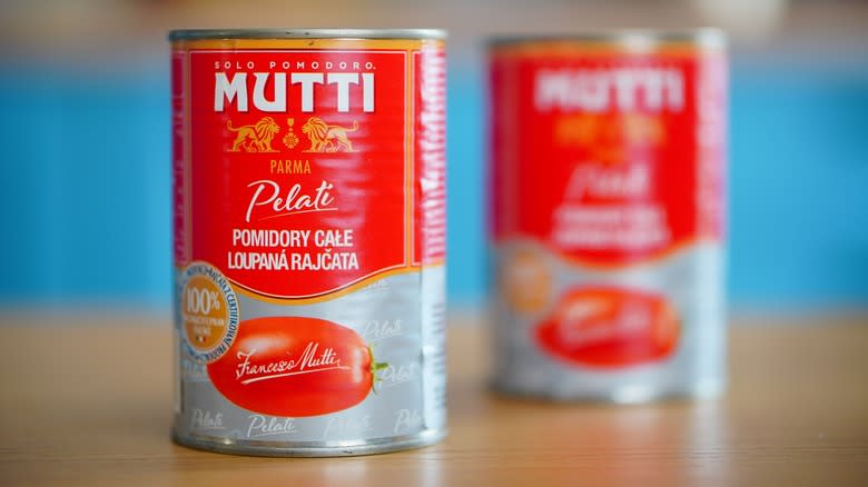 Cans of Mutti tomatoes