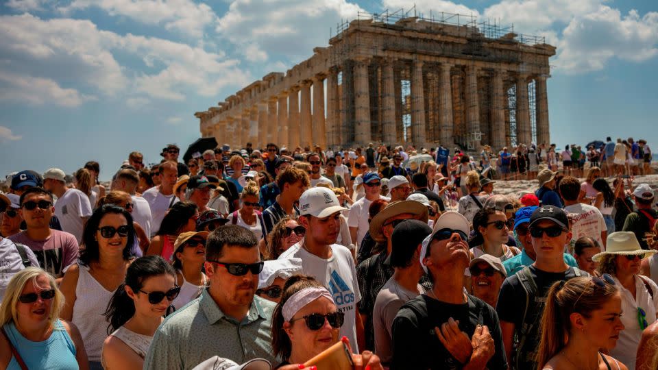 Athens placed a cap on visitor numbers to the ancient Acropolis in the summer of 2023. - Thanassis Stavrakis/AP