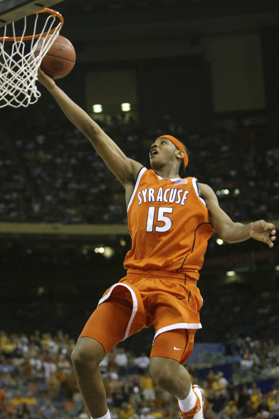 FILE - Syracuse's Carmelo Anthony puts up a layup in the closing seconds of a 95-84 win over Texas in the semifinals of the Final Four in New Orleans, April 5, 2003. Anthony got better as Syracuse went deeper into the tournament, scoring 33 points in the Final Four against Texas and finished with 20 and 10 rebounds against Kansas for the Orange's first national title. (AP Photo/Michael Conroy, File)