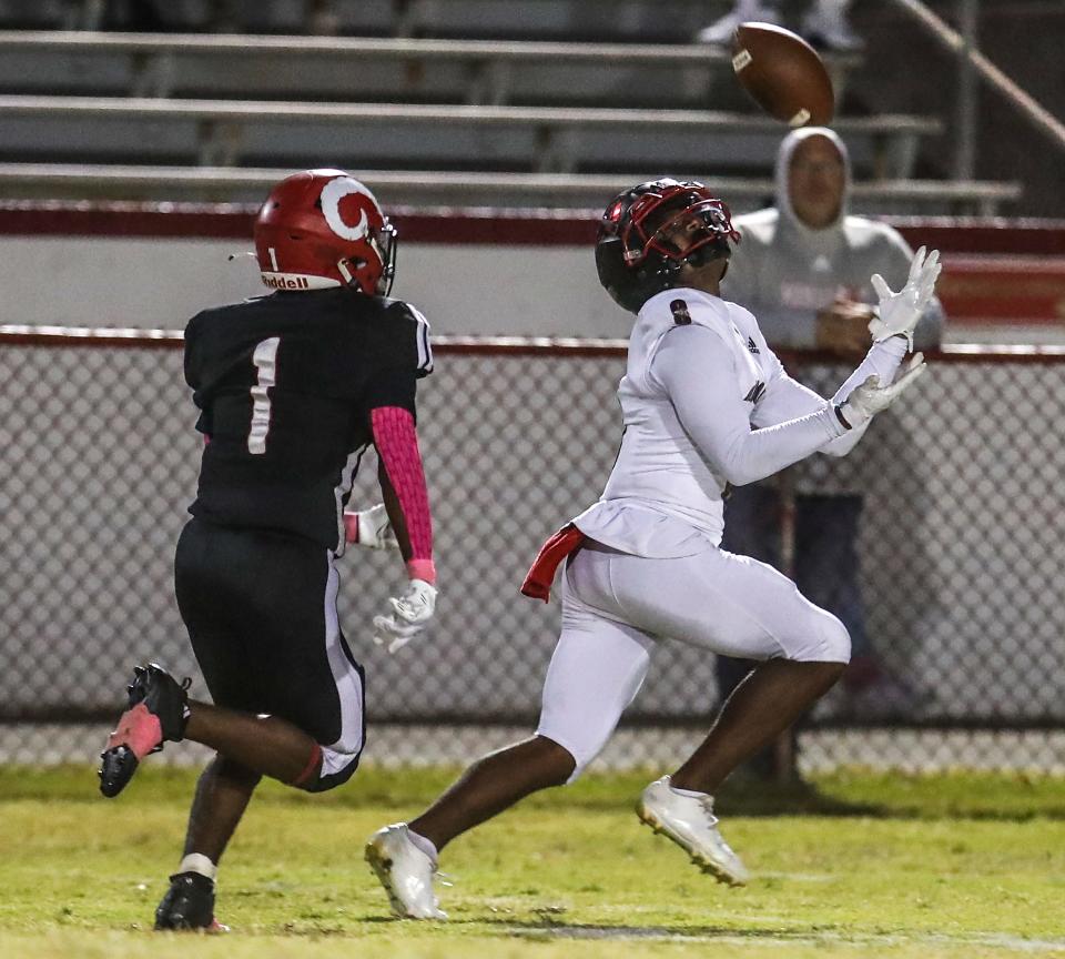 PRP's Santana Crayton pulls down a pass and runs into the end zone to put the first points on the board against Manual